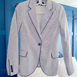 Majora blazer with black stripes and piping.